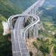 Image for article titled This 'High-Speed' Turnaround On A Long Mountain Highway Is A Brilliant Time-Saver